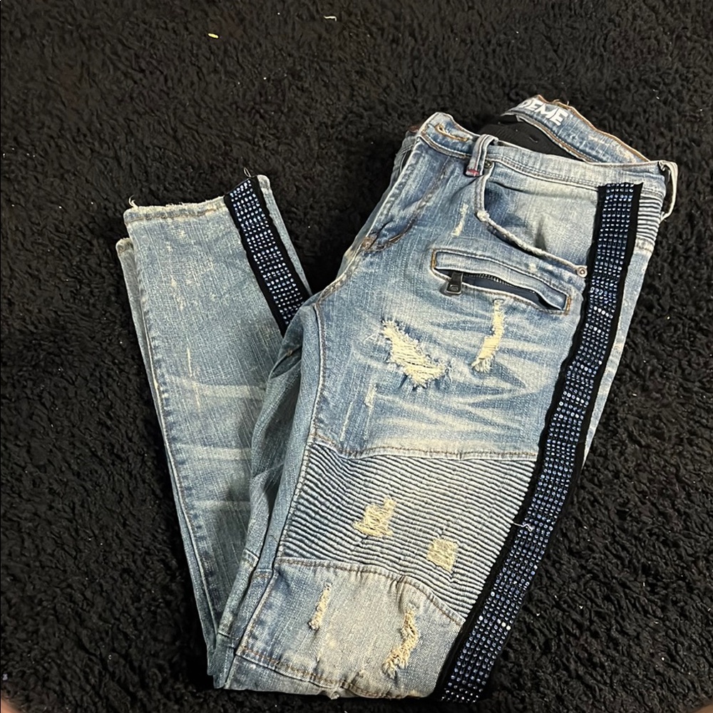 Distressed Blue Jeans with blue rhinestones